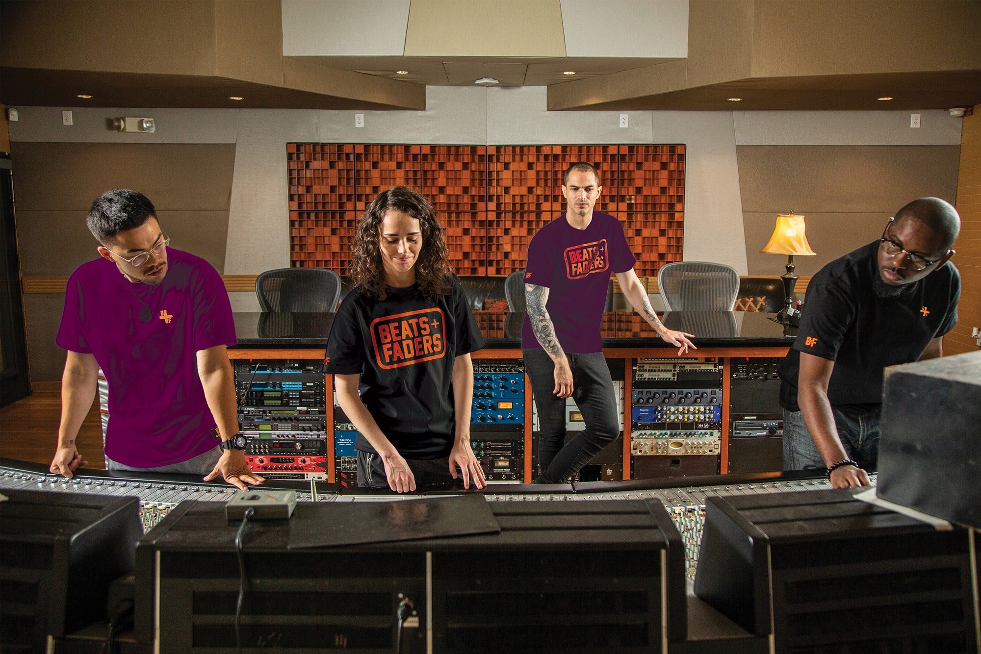 (4) music creators wearing Beats and Faders clothing in studio